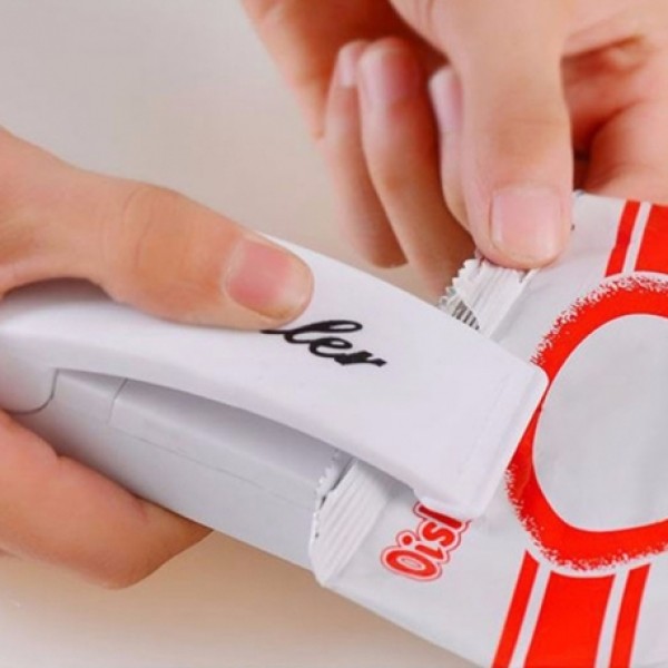 Pakuočių užlydimo aparatas 